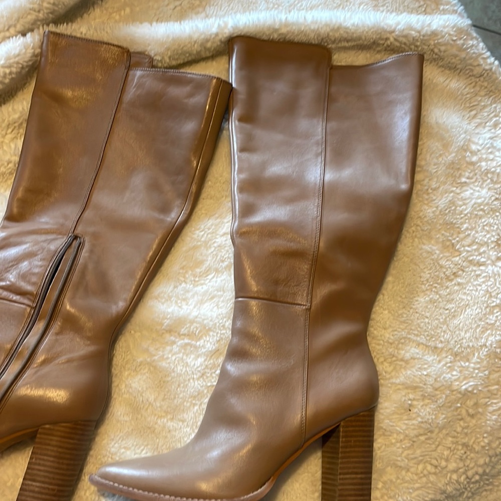 Like new excellent condition butter soft leather tan